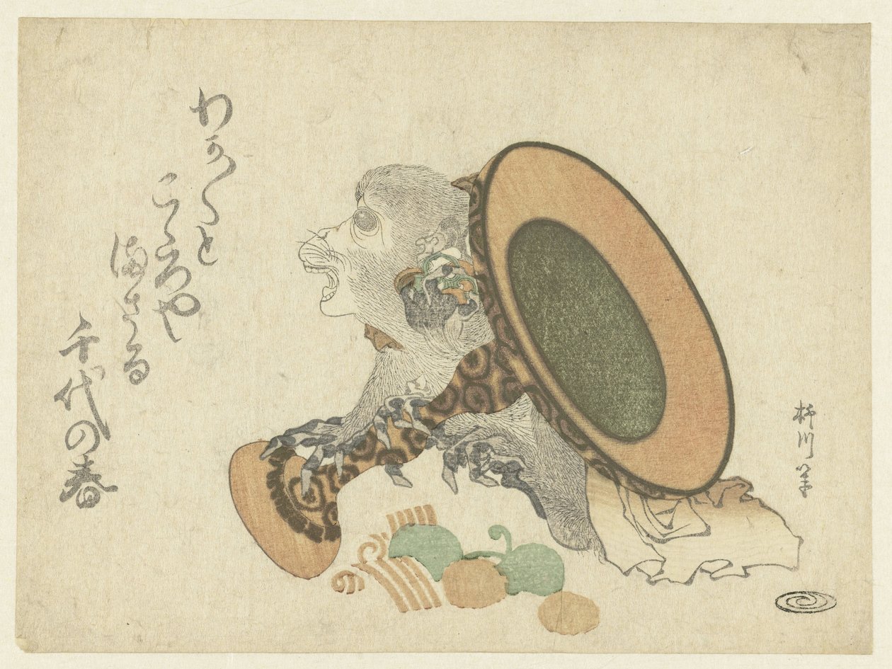漆塗りの盆を押す猿 作： 柳川しねごぶ