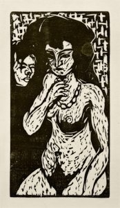 自画像を持つ裸の女の子