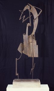 髪を整える女、1929〜30年（金属）