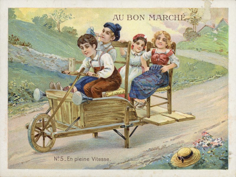 改造された手押し車で遊ぶ子供たち 作： フランス語学校